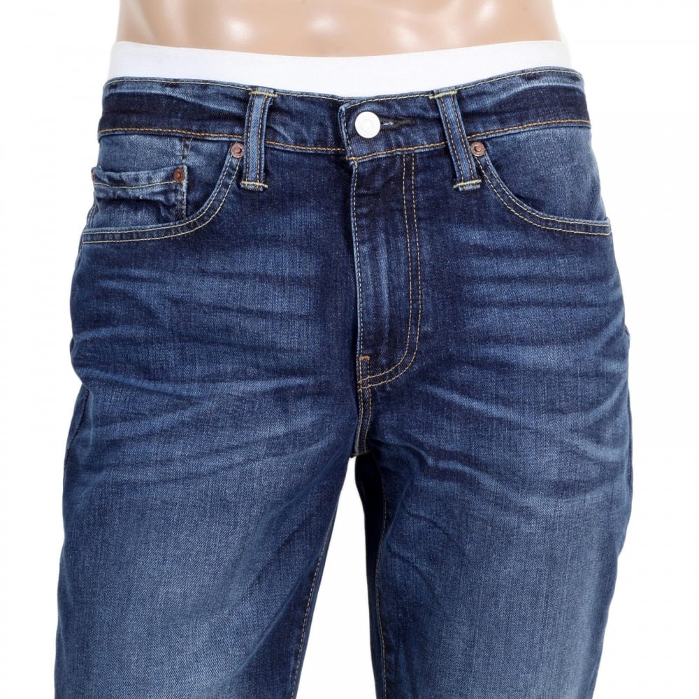 Lower Waist Iron Brutus 511 Slim Fit Jeans in Mid Blue with Fading and Whiskering