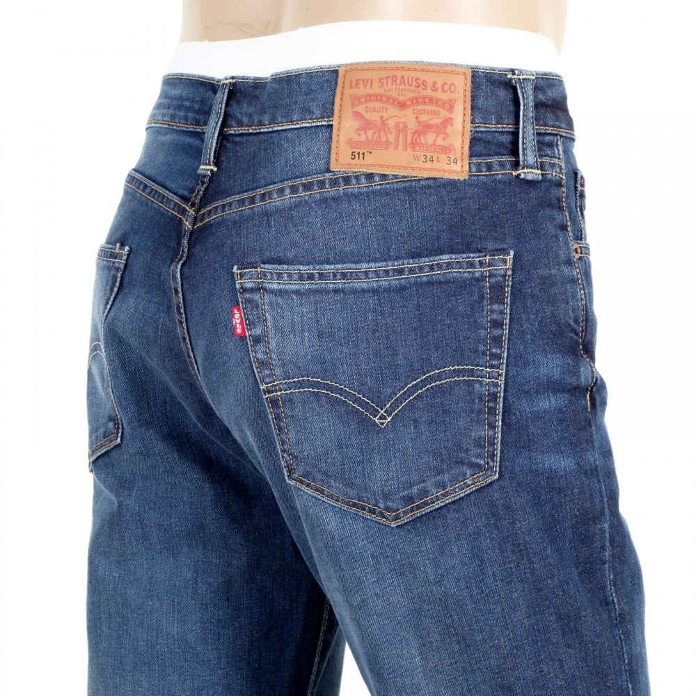 Lower Waist Iron Brutus 511 Slim Fit Jeans in Mid Blue with Fading and Whiskering
