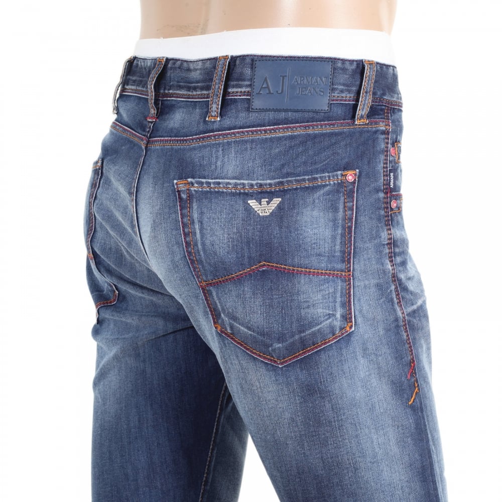 Worn Finished Heavily Faded Extra Slim J35 Washed Denim Jeans with Styled Creasing and A Repair Patch