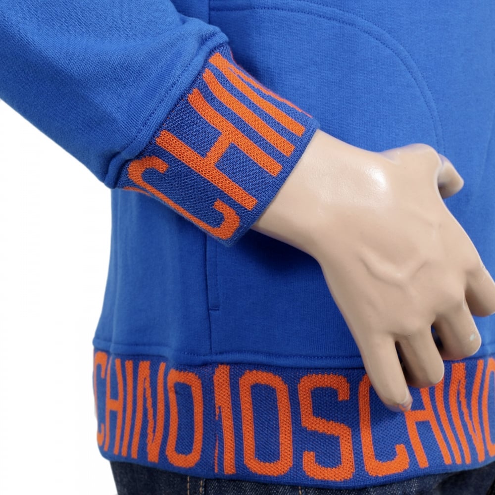 Regular Fit Blue Hooded Sweatshirt with Woven Orange Text Logo on Ribbed Collar, Waistband, and Sleeve Cuffs