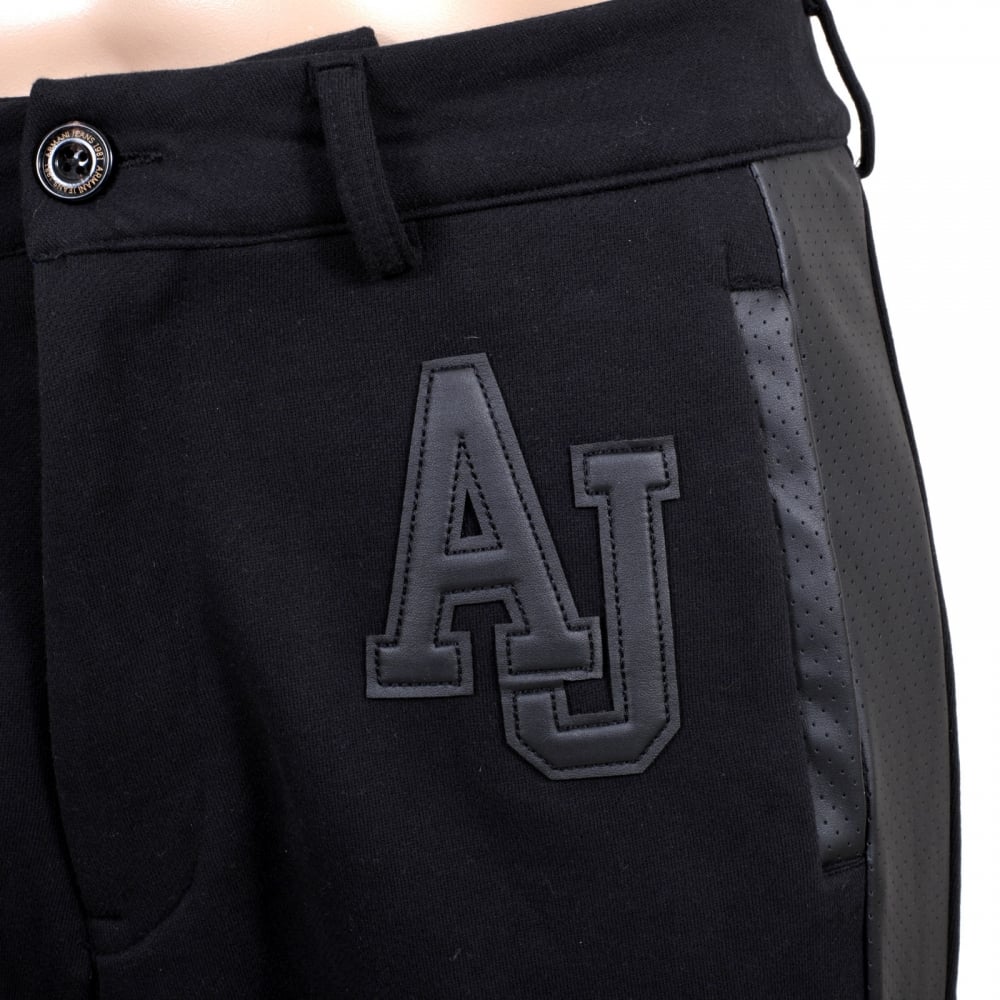 Black Track Pants with Zip Fly, Cuffed Bottoms, Pleather Logo, Side Panels and Two Front and a Back Pocket